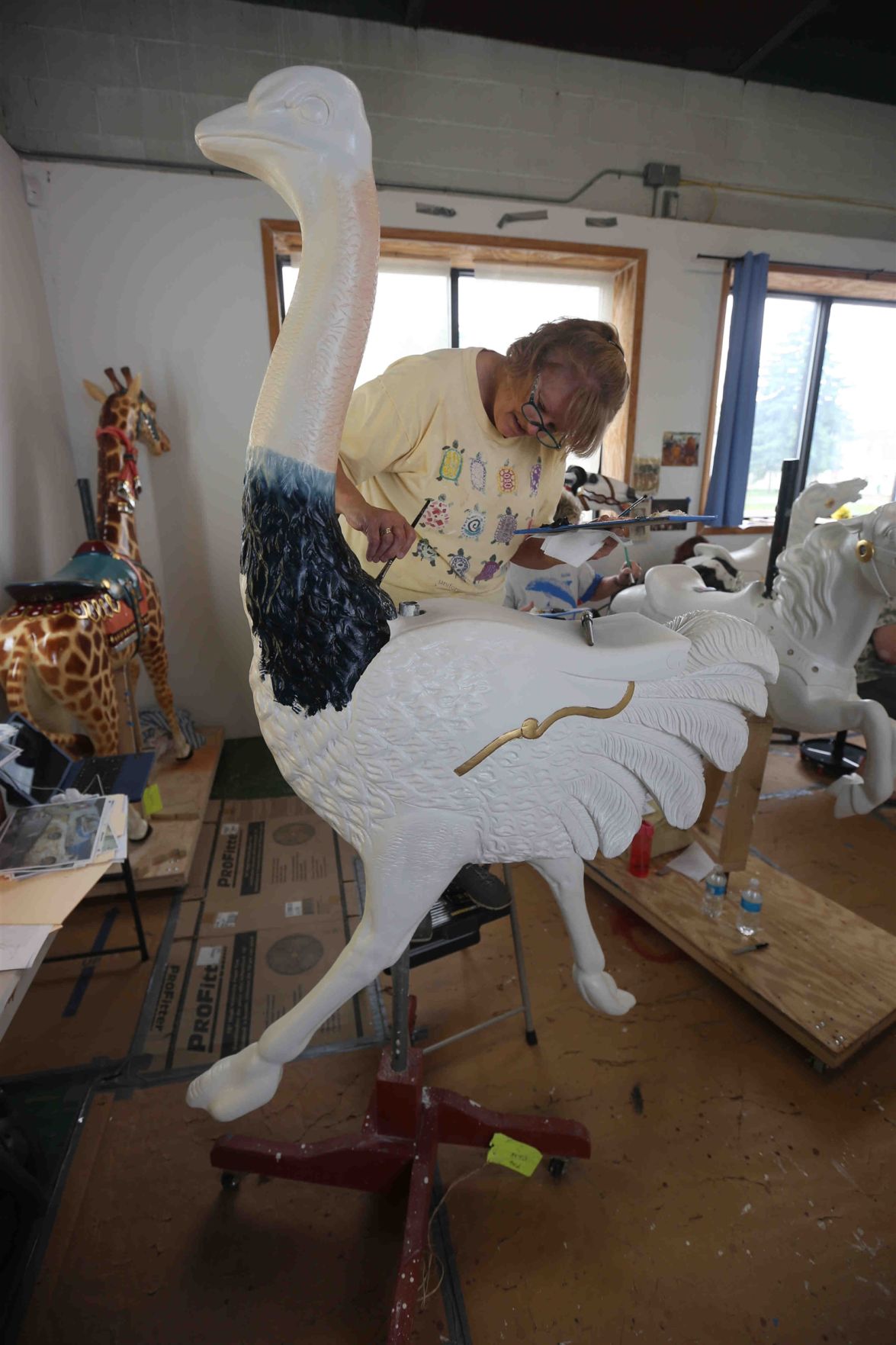 Buffalo Heritage Carousel restoration team's work in progress